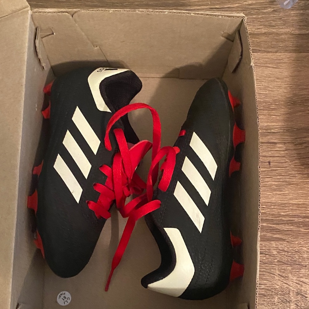 Adidas Black Cleats with Red Accents